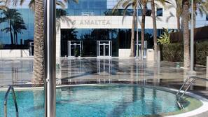 Seasonal outdoor pool, pool umbrellas, pool loungers