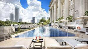 Outdoor pool, pool umbrellas, sun loungers