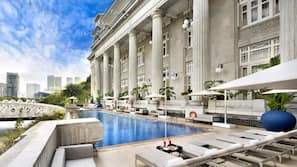 Outdoor pool, pool umbrellas, sun loungers