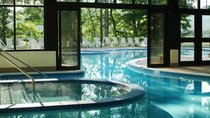 Indoor pool, outdoor pool, pool umbrellas, sun loungers