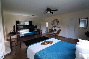 Deluxe Room, Multiple Beds, Private Bathroom | Individually decorated, free WiFi
