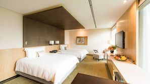 Hypo-allergenic bedding, down comforters, minibar, in-room safe