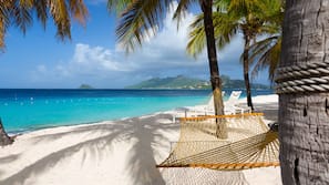 Private beach, white sand, free beach cabanas, sun loungers