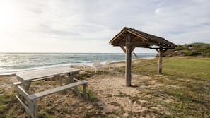 Private beach, white sand, free beach cabanas, sun loungers