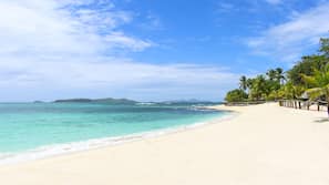Private beach, white sand, free beach cabanas, sun loungers