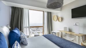 Ropa de cama de alta calidad, minibar, caja fuerte y escritorio