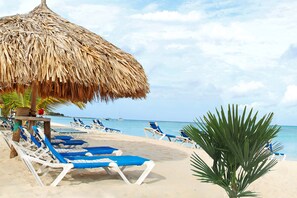 On the beach, white sand, free beach shuttle, beach cabanas