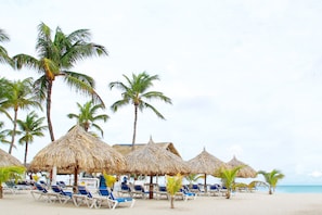 On the beach, white sand, free beach shuttle, beach cabanas