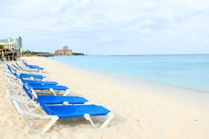 On the beach, white sand, free beach shuttle, beach cabanas