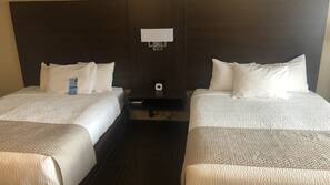 Premium bedding, pillowtop beds, desk, blackout drapes