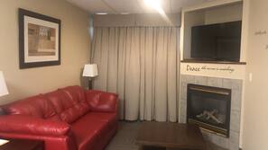 42-inch TV with cable channels, fireplace, pay movies