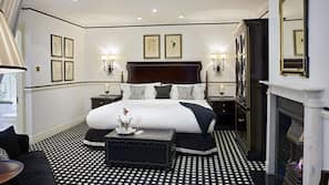 Roupas de cama premium, frigobar, cofres nos quartos