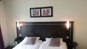 Een kluis op de kamer, een bureau, geluiddichte muren, gratis babybedden