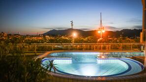 Seasonal outdoor pool, pool loungers