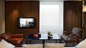 101-cm LCD TV with cable channels, pay-per-view films