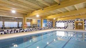 Indoor pool, seasonal outdoor pool, pool umbrellas, pool loungers