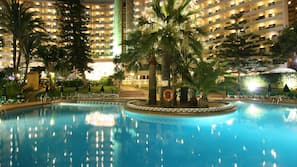 Indoor pool, seasonal outdoor pool, pool umbrellas, pool loungers