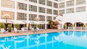 Outdoor pool, pool umbrellas, pool loungers