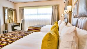 Premium bedding, free minibar items, in-room safe, desk
