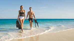 Private beach, white sand, sun loungers, beach umbrellas