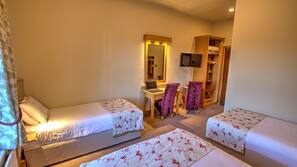 Desk, laptop workspace, blackout curtains, iron/ironing board