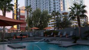 Outdoor pool, open 6:00 AM to 9:00 PM, pool umbrellas, pool loungers