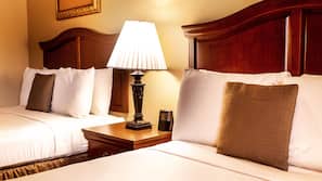 Premium bedding, desk, laptop workspace, blackout drapes