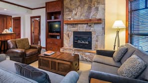 LCD TV, fireplace, DVD player, heated floors