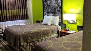 Blackout drapes, iron/ironing board, free cribs/infant beds