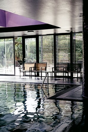 Indoor pool, seasonal outdoor pool, pool umbrellas, sun loungers