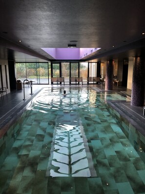 Indoor pool, seasonal outdoor pool, pool umbrellas, sun loungers