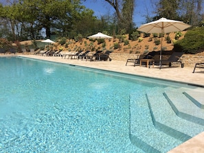 Indoor pool, seasonal outdoor pool, pool umbrellas, sun loungers