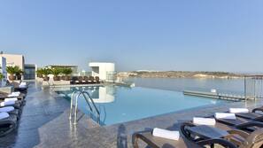 Indoor pool, outdoor pool, pool umbrellas
