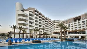 Indoor pool, outdoor pool, pool umbrellas