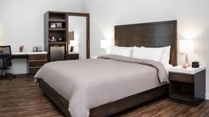 Luxe beddengoed, een kluis op de kamer, een bureau
