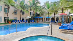 Outdoor pool, pool umbrellas, sun loungers