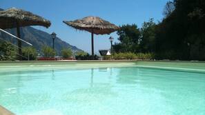 Seasonal outdoor pool, sun loungers