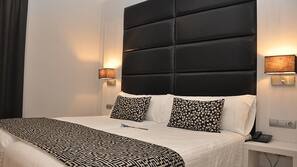 Luxe beddengoed, een kluis op de kamer, individueel gemeubileerd