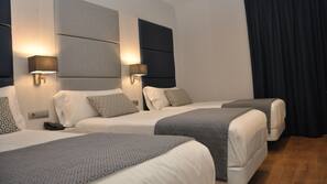 Luxe beddengoed, een kluis op de kamer, individueel gemeubileerd