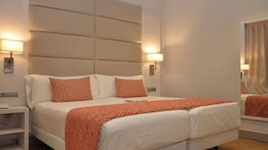 Luxe beddengoed, een kluis op de kamer, individueel gemeubileerd
