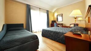 Hypo-allergenic bedding, in-room safe, desk, laptop workspace