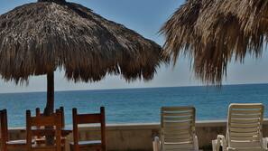 Private beach, free beach cabanas, beach umbrellas, beach towels