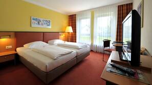 Hochwertige Bettwaren, kostenlose Minibar, Zimmersafe, Schreibtisch