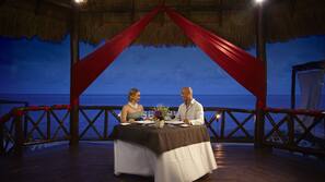 On the beach, white sand, beach umbrellas, beach towels