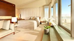 Ropa de cama hipoalergénica, minibar, caja fuerte y escritorio