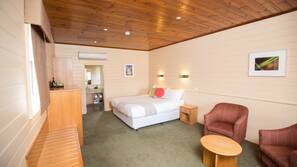 Premium bedding, desk, laptop workspace, blackout curtains