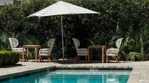 Outdoor pool, free cabanas, pool umbrellas