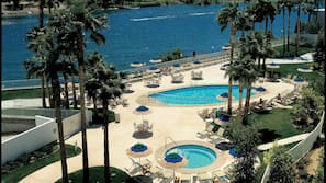 Outdoor pool, cabanas (surcharge), pool umbrellas