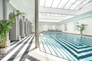 Indoor pool, open 7:00 AM to 10:00 PM, sun loungers