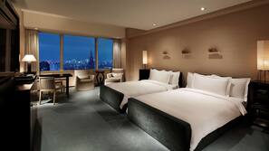 Premium bedding, down comforters, minibar, in-room safe